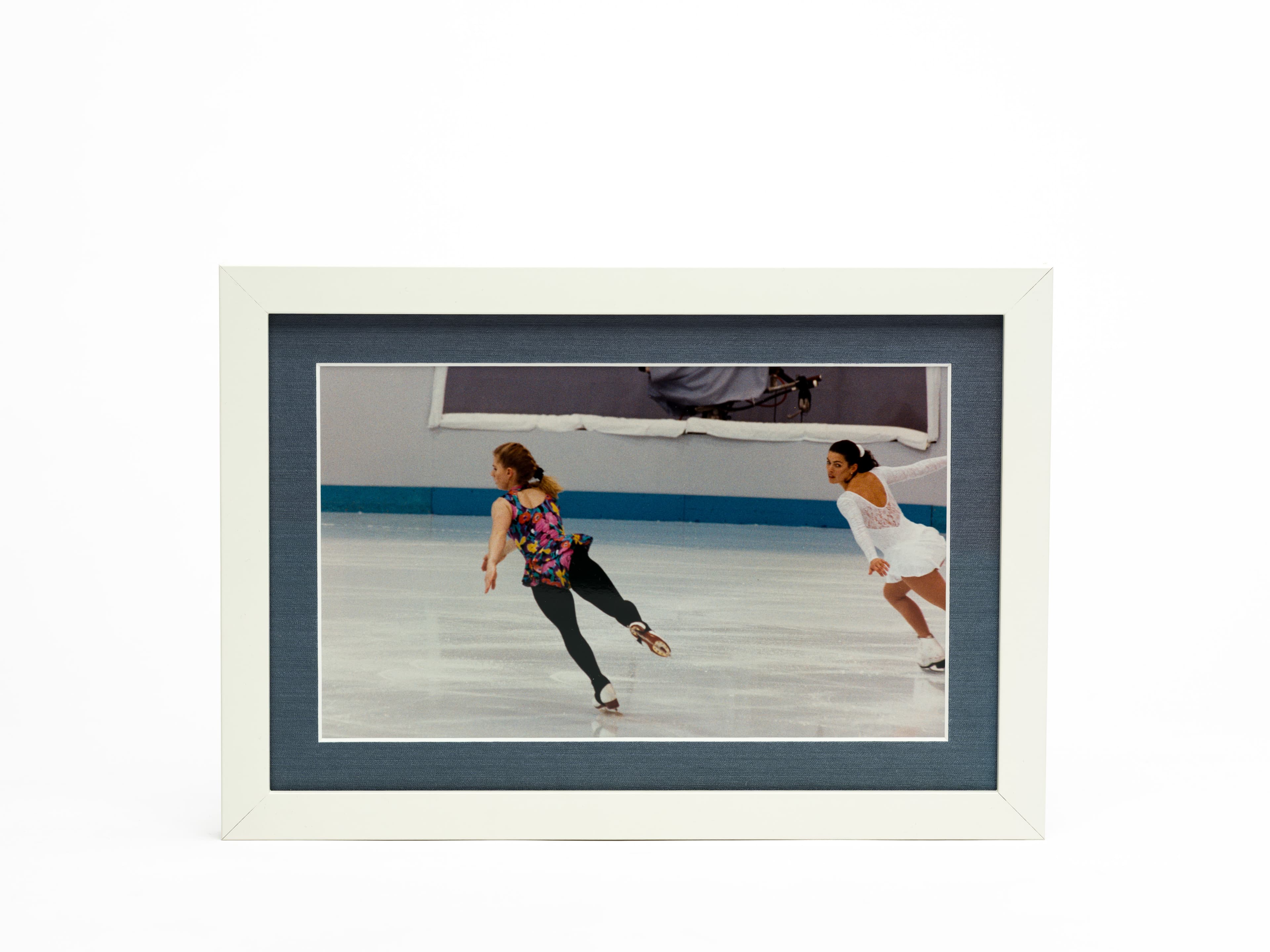 Photograph of Tonya Harding and Nancy Kerrigan skating
